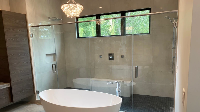Inabinet Glass & Mirror | Columbia, SC | custom shower doors behind tub